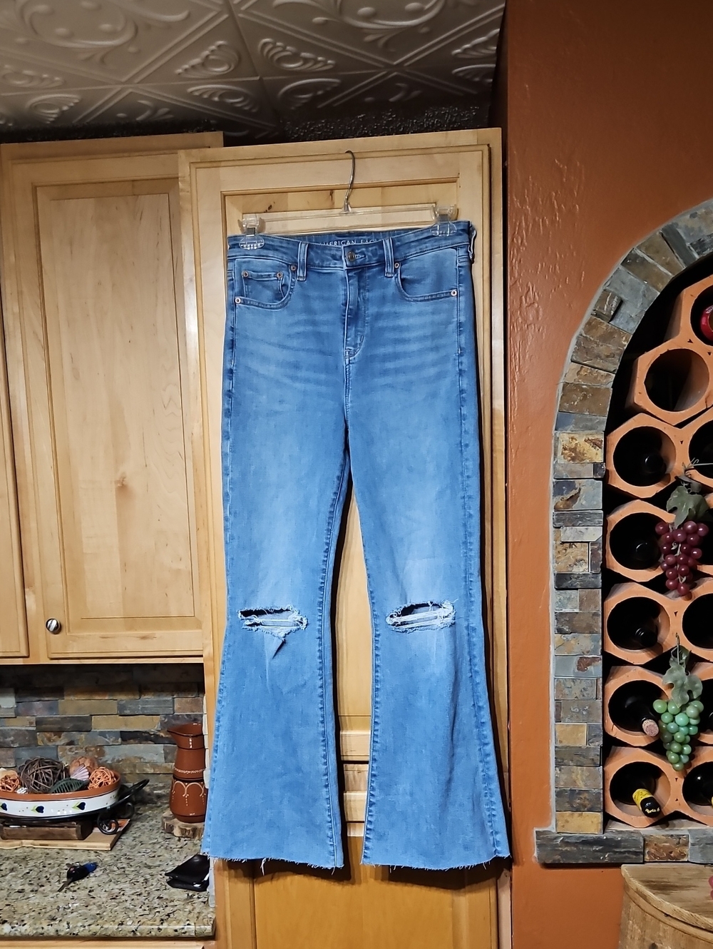 American Eagle Distressed Blue Next Level Stretch Super High-Rise Flare Jeans